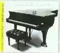 <b>Elton John</b> • Here and There